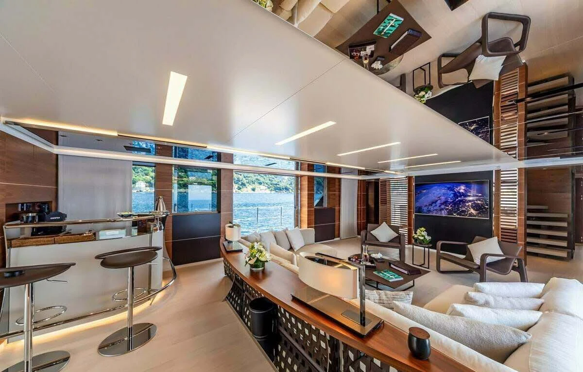a living room with a large window aboard LADY A Yacht for Sale