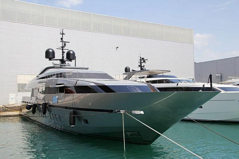 a boat docked in a harbor aboard LADY A Yacht for Sale