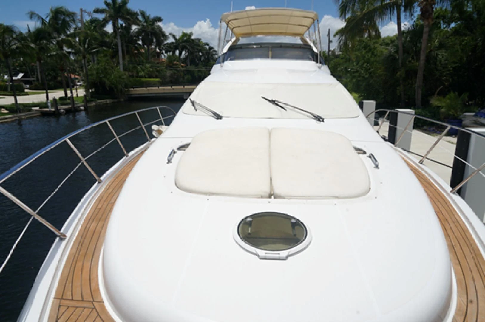 a white boat in a pool aboard EUROPA Yacht for Sale