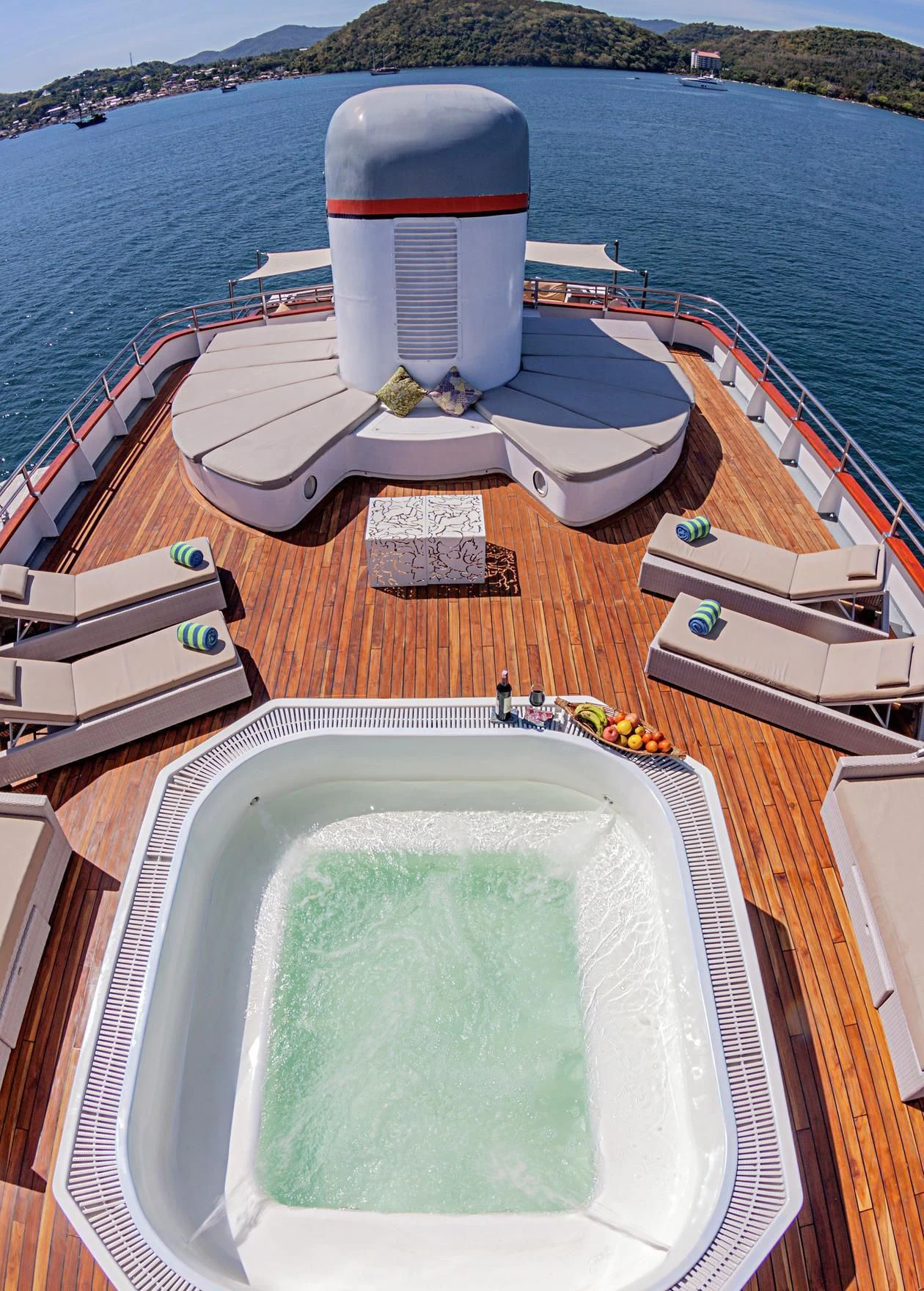a deck with a pool and a pool on it aboard SALILA Yacht for Sale