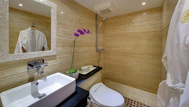 a bathroom with a sink and a mirror aboard SALILA Yacht for Sale