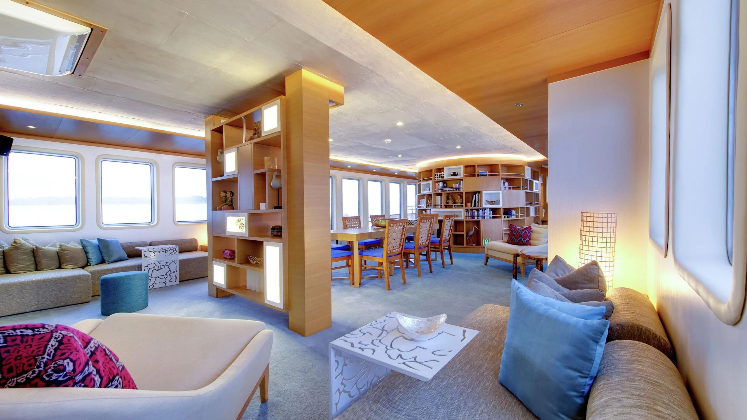 a living room with a large window aboard SALILA Yacht for Sale
