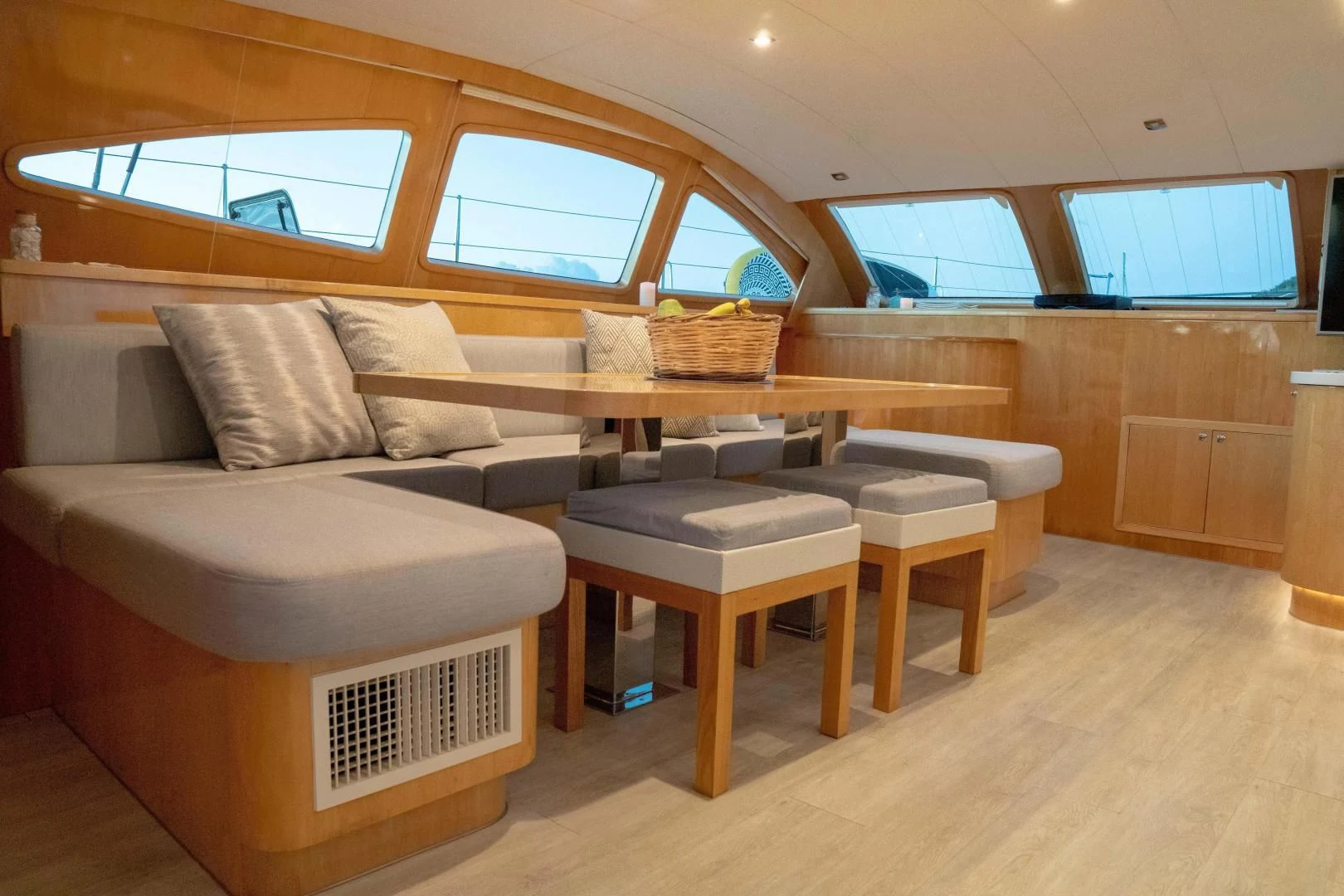 a room with a couch and a table aboard LAYSAN Yacht for Sale