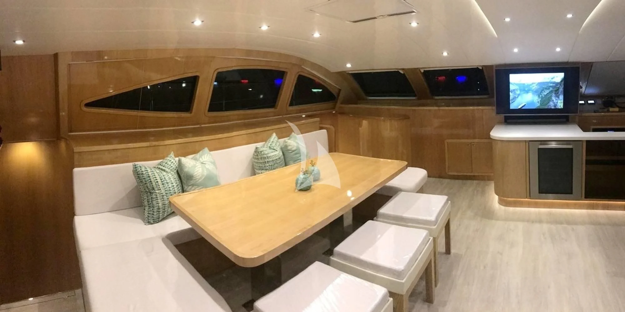 a room with a couch and a television aboard LAYSAN Yacht for Sale