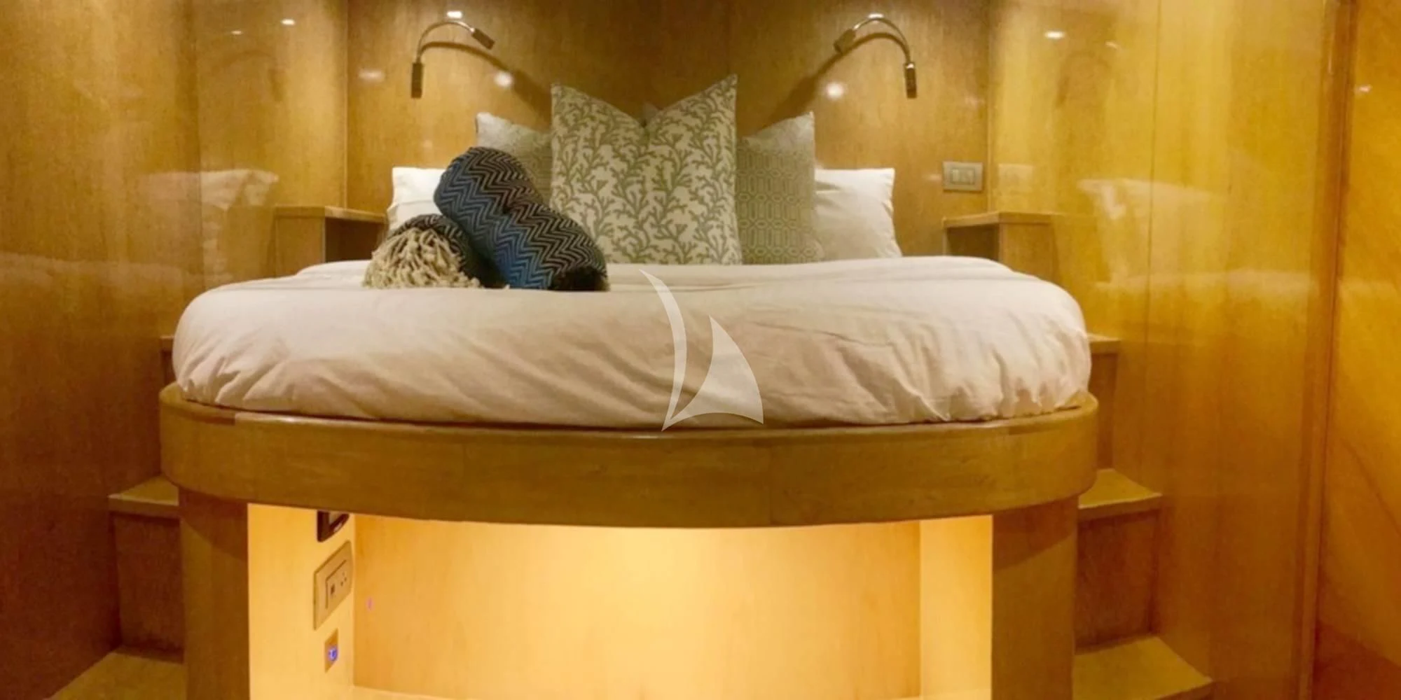 a bed with white sheets aboard LAYSAN Yacht for Sale