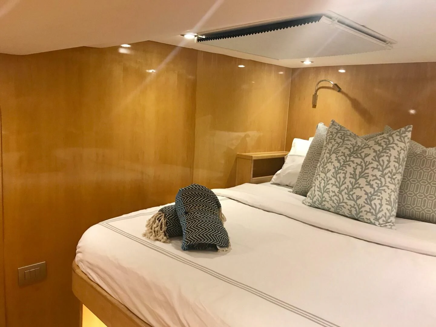 a bed with pillows aboard LAYSAN Yacht for Sale
