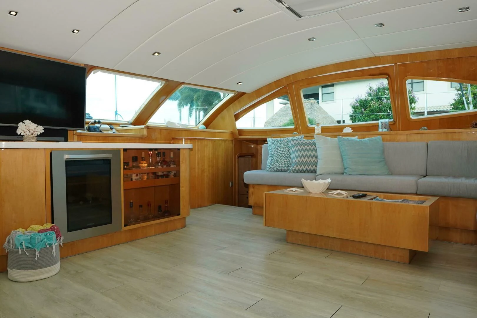 a living room with a couch and a tv aboard LAYSAN Yacht for Sale