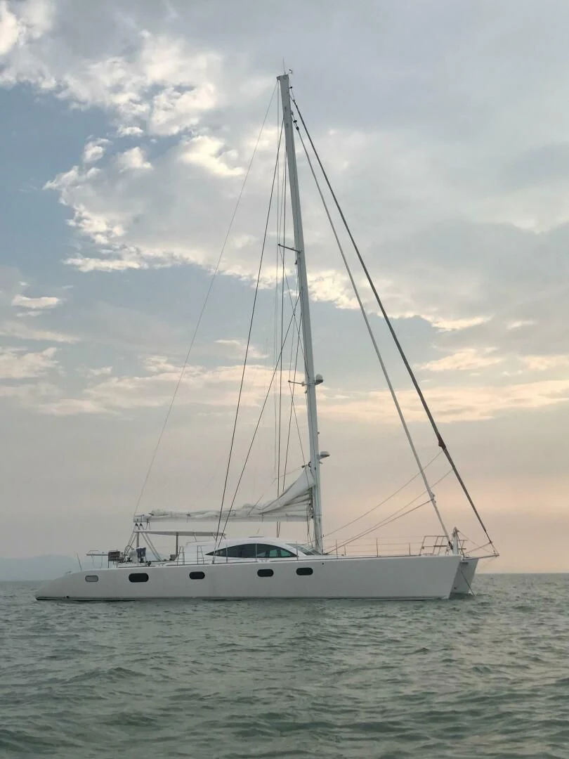 a sailboat on the water aboard LAYSAN Yacht for Sale