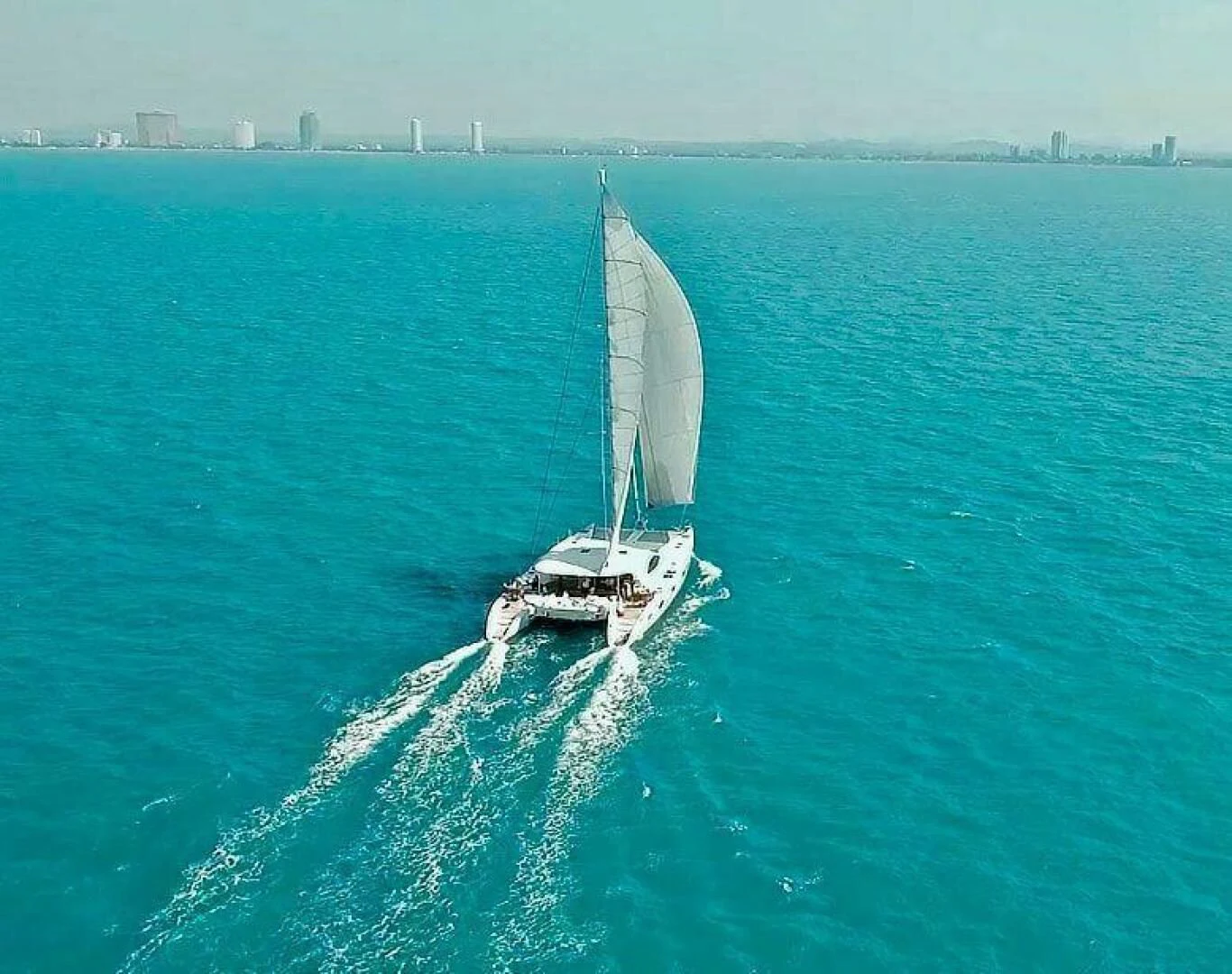 a sailboat on the water aboard LAYSAN Yacht for Sale
