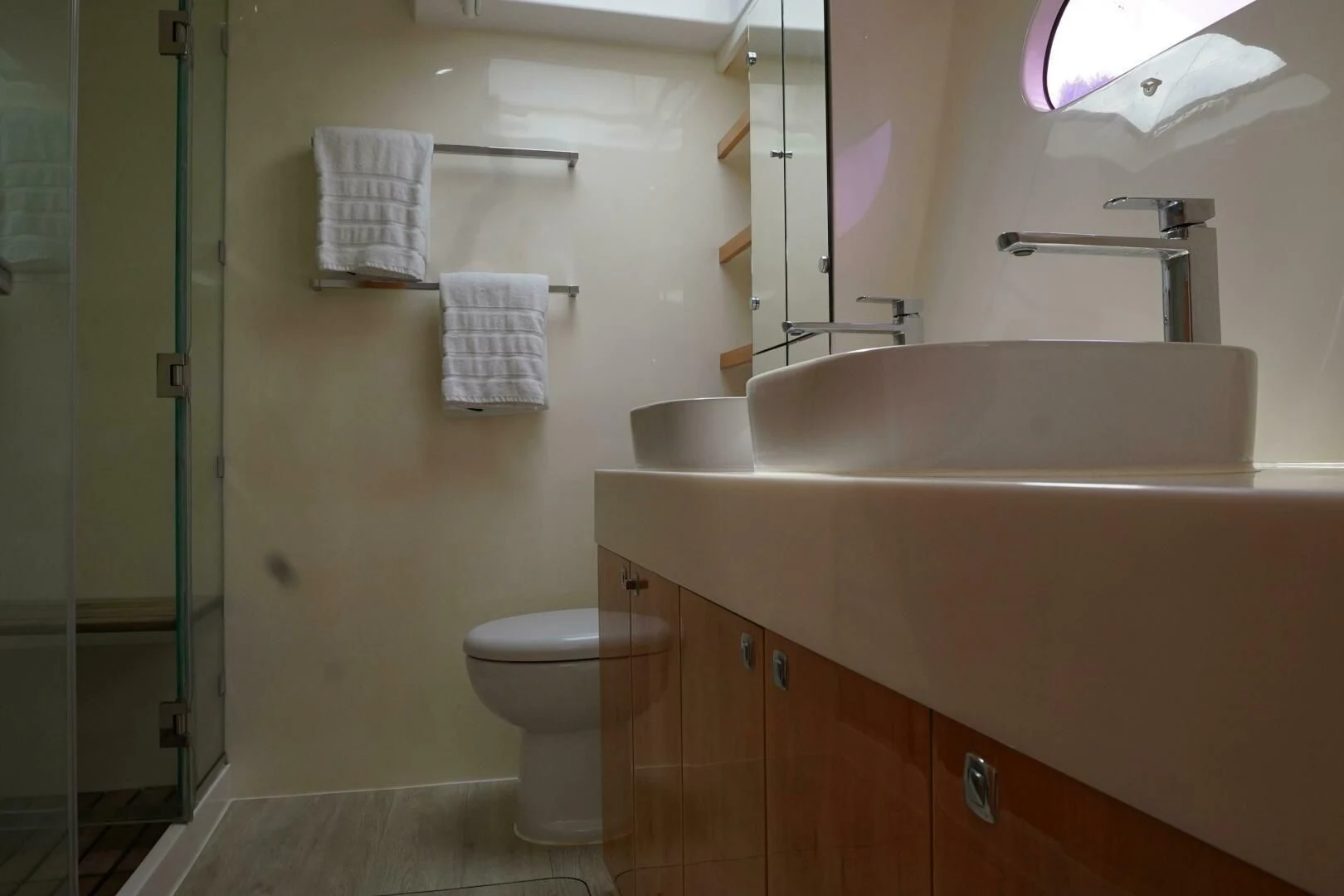 a bathroom with a sink and toilet aboard LAYSAN Yacht for Sale
