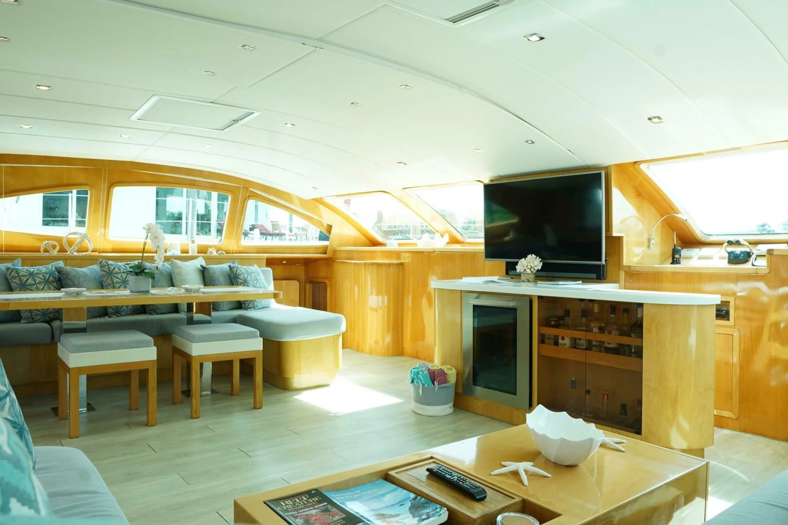 a room with a fireplace and a tv aboard LAYSAN Yacht for Sale