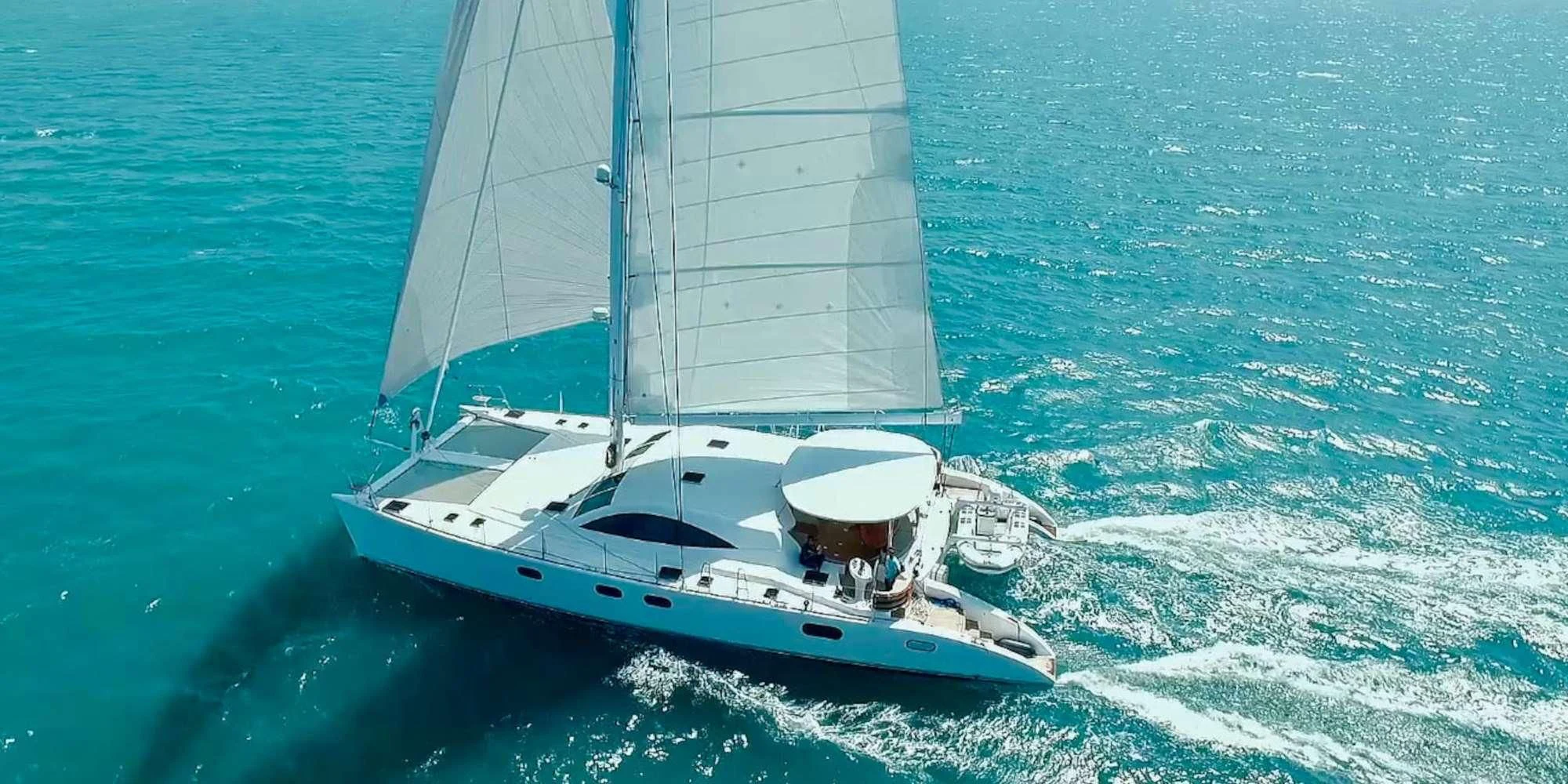 a boat sailing on the sea aboard LAYSAN Yacht for Sale