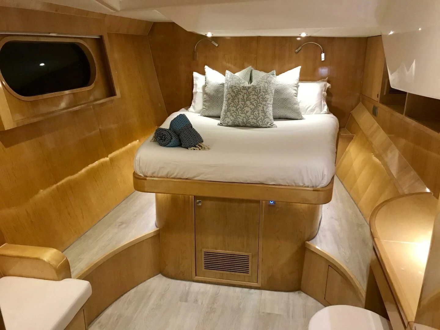a bed with pillows on it aboard LAYSAN Yacht for Sale