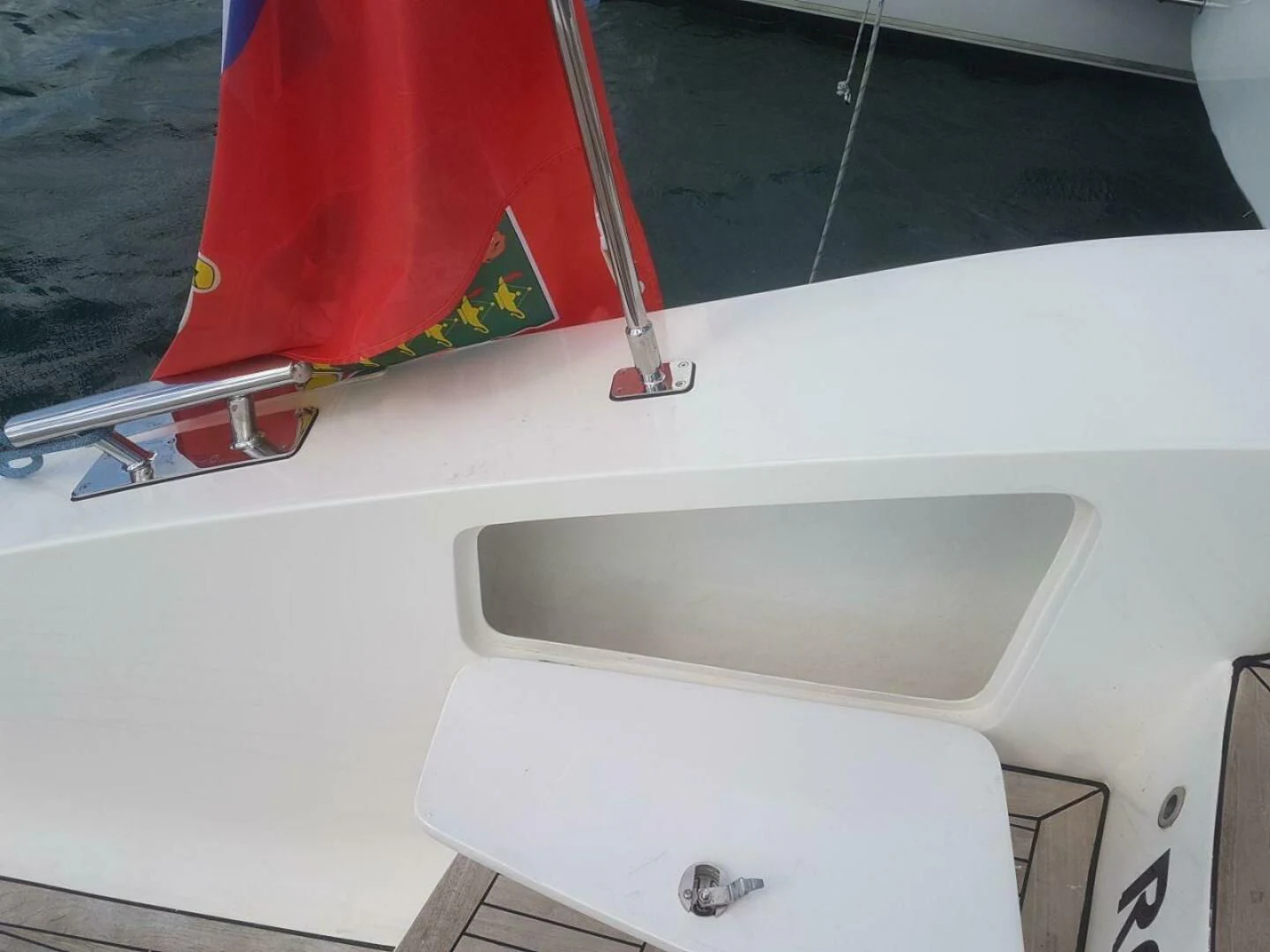 a white rectangular object with a red object on it aboard LAYSAN Yacht for Sale