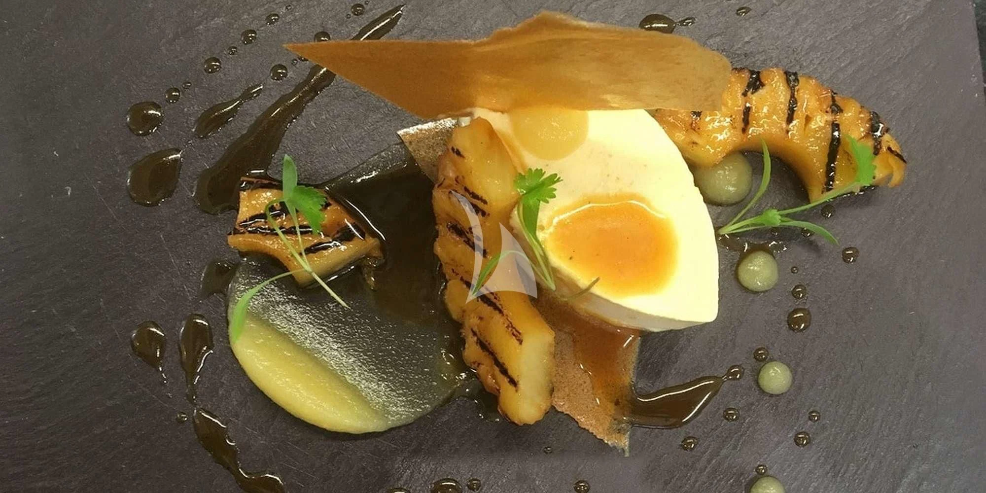 a plate of food aboard LAYSAN Yacht for Sale