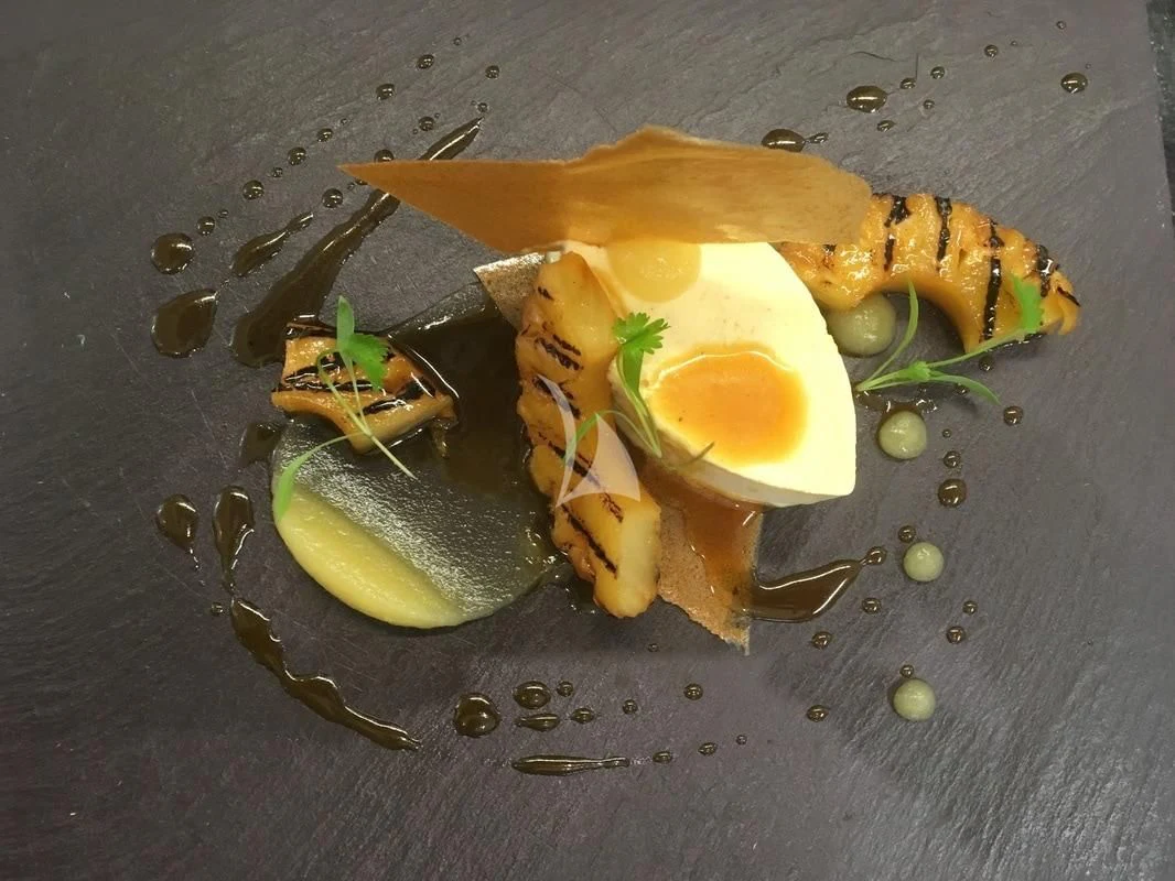 a plate of food aboard LAYSAN Yacht for Sale