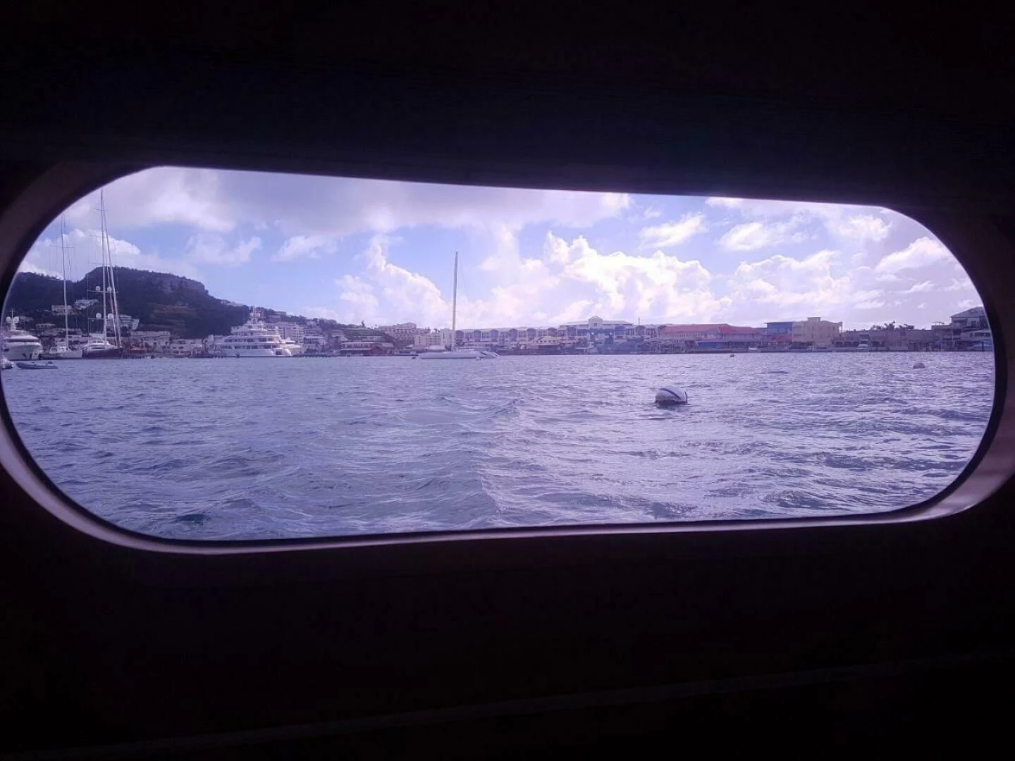 a body of water with a boat in it aboard LAYSAN Yacht for Sale