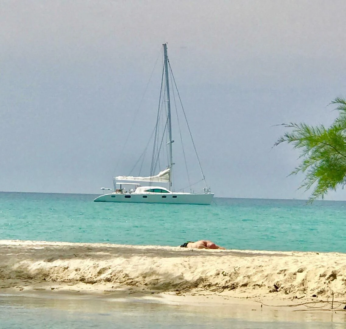 a boat on the beach aboard LAYSAN Yacht for Sale