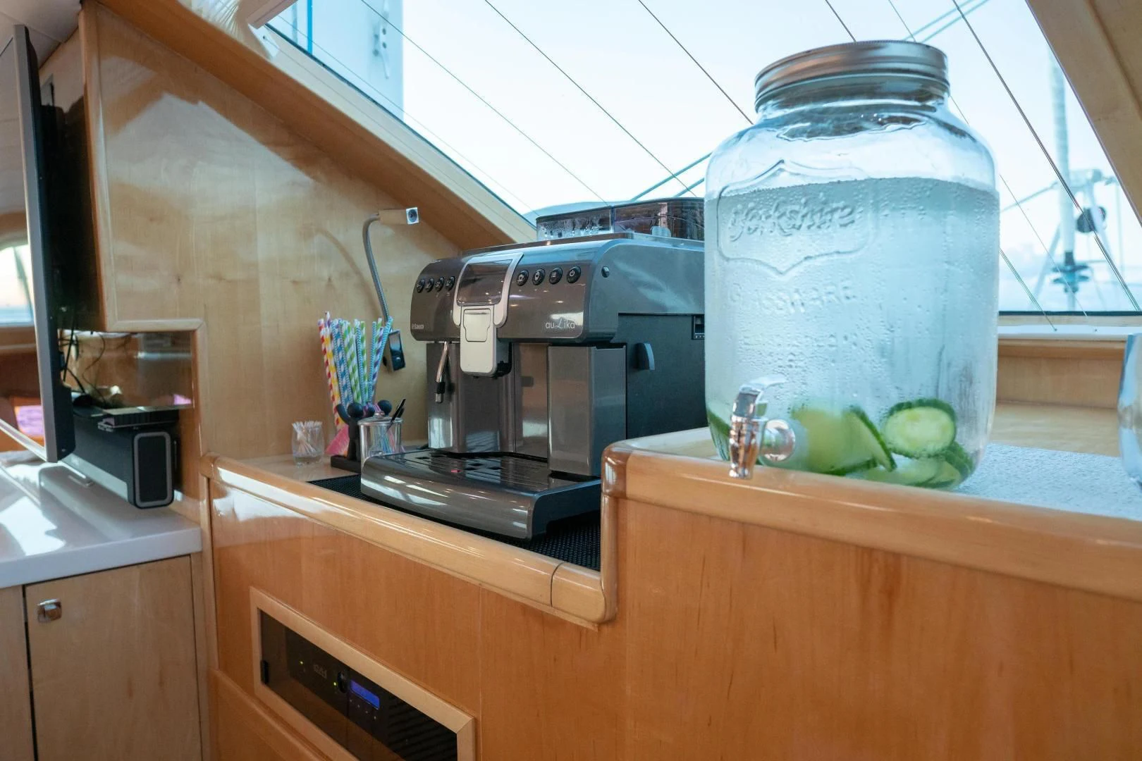 a kitchen with a blender and a jar of fruit on a counter aboard LAYSAN Yacht for Sale