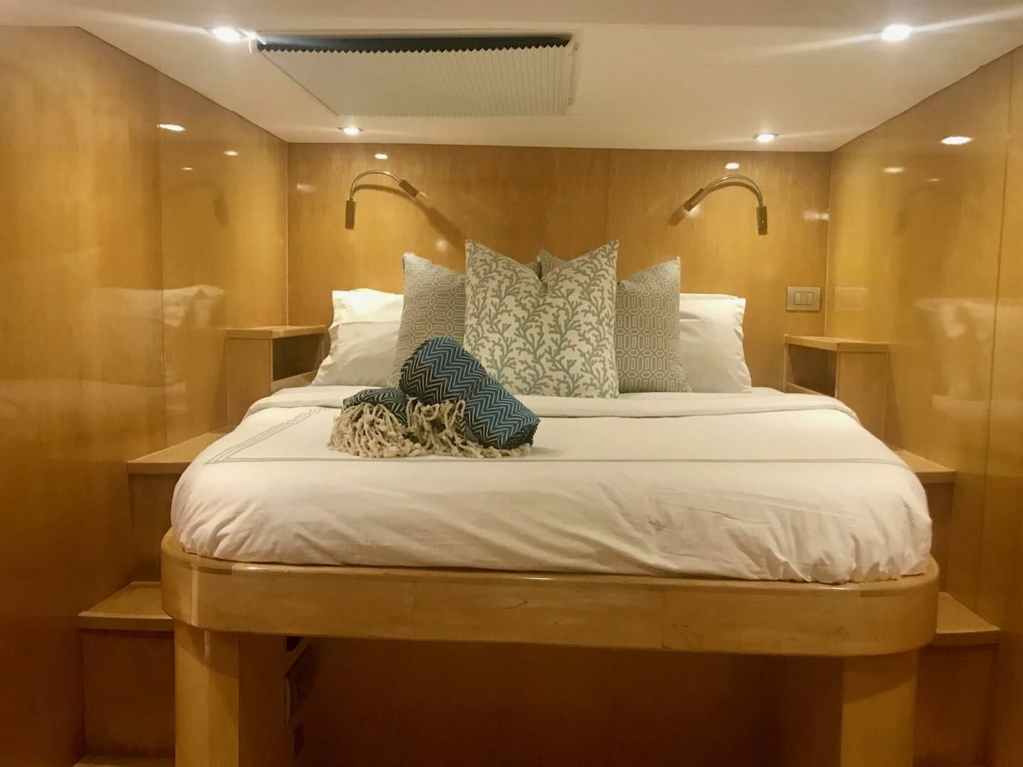 a bed with pillows aboard LAYSAN Yacht for Sale