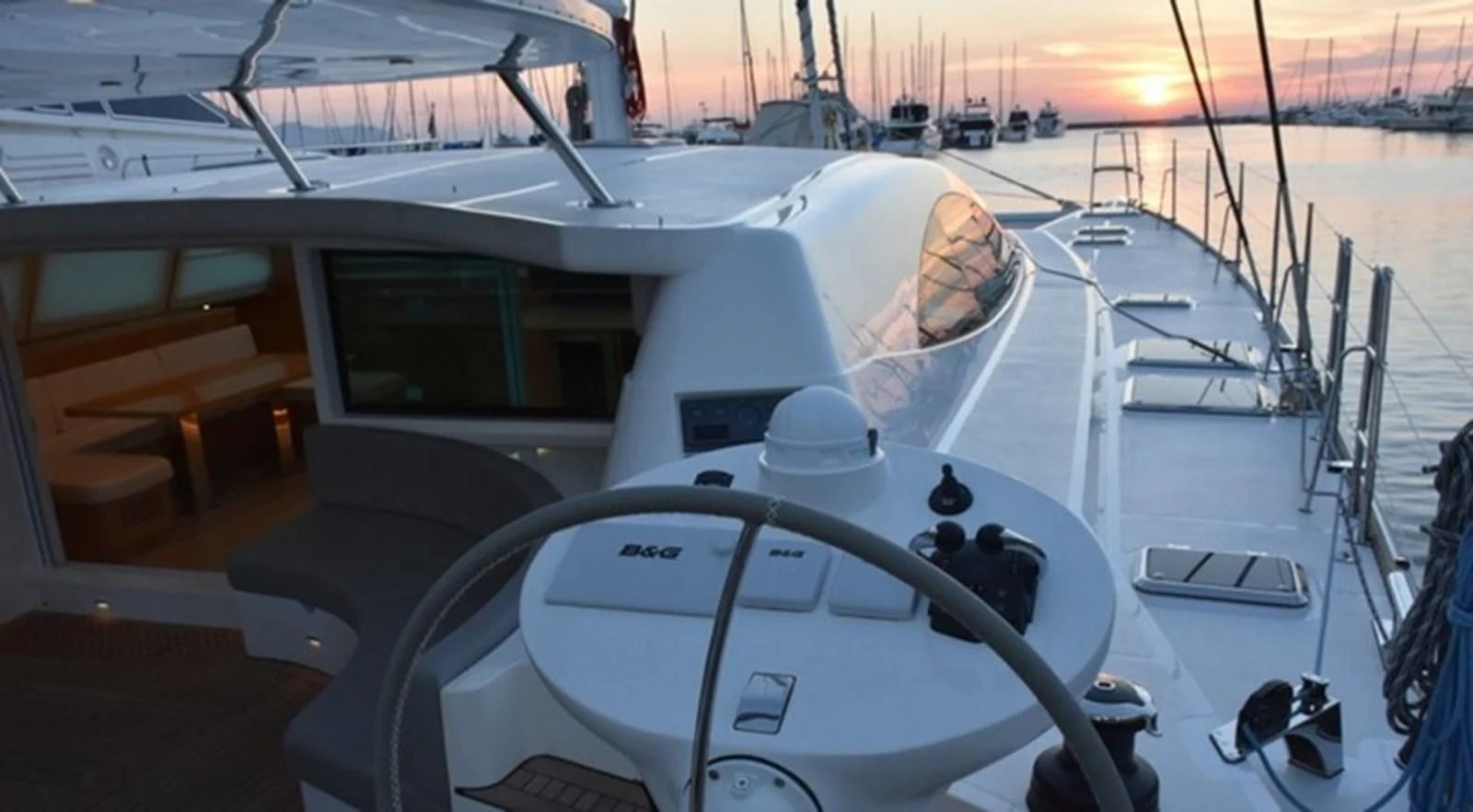 a boat with a person sitting on it aboard LAYSAN Yacht for Sale