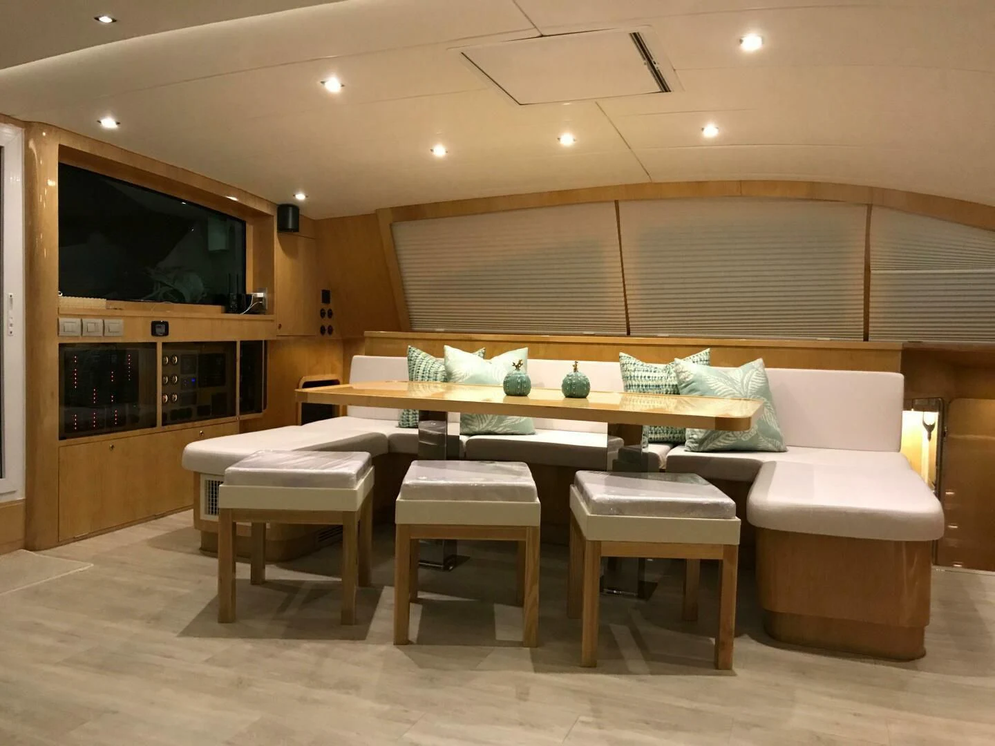 a living room with a couch and a table aboard LAYSAN Yacht for Sale