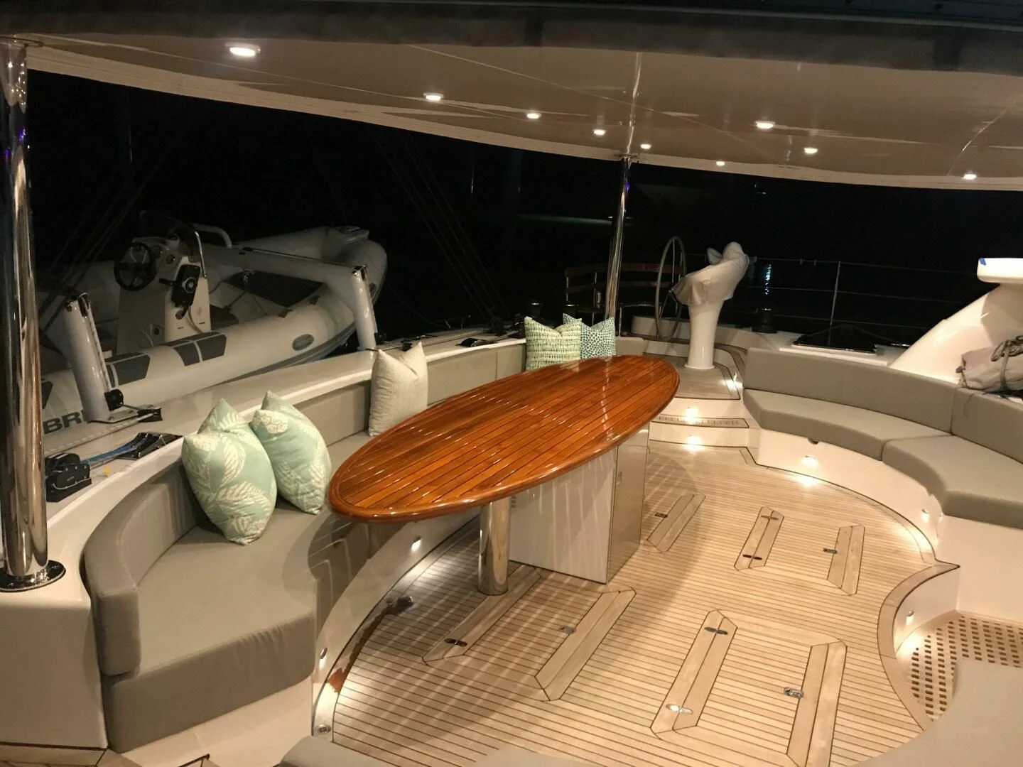 a table with a large wooden object on it aboard LAYSAN Yacht for Sale