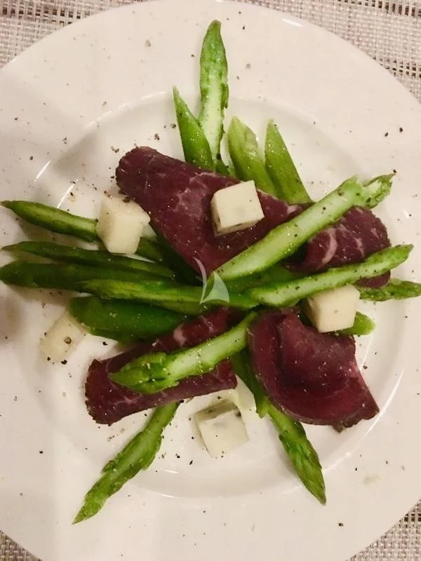 a plate of food aboard LAYSAN Yacht for Sale