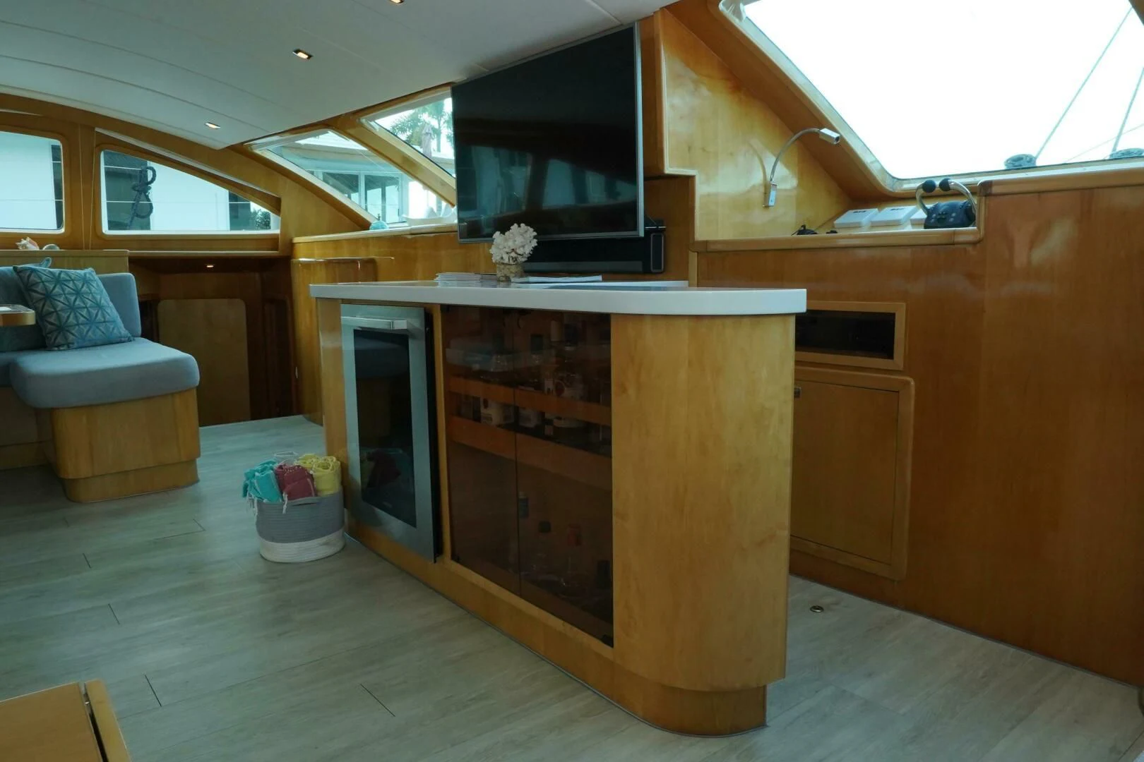 a wood cabinet in a room aboard LAYSAN Yacht for Sale