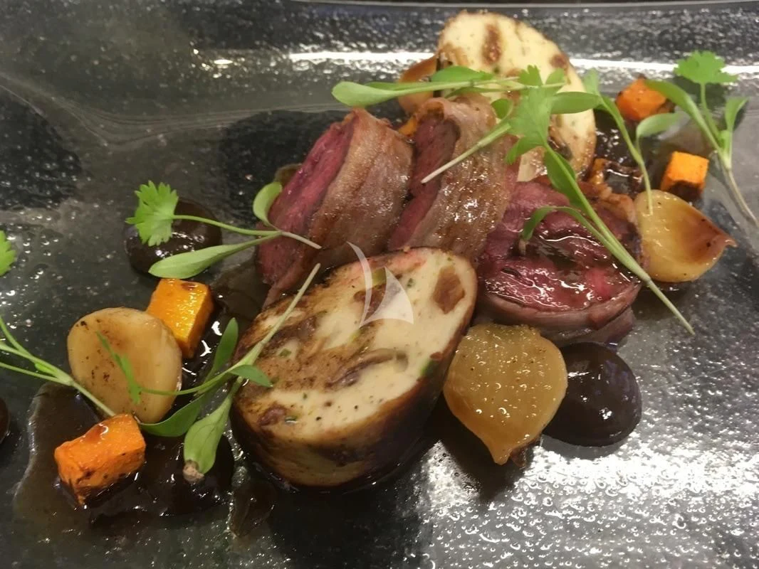 a plate of food aboard LAYSAN Yacht for Sale