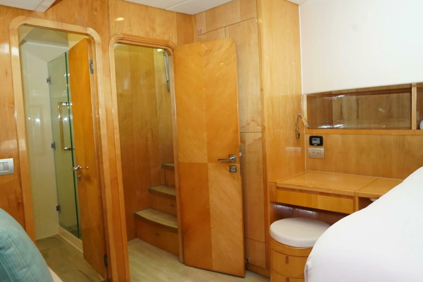 a bathroom with a toilet and a shower aboard LAYSAN Yacht for Sale