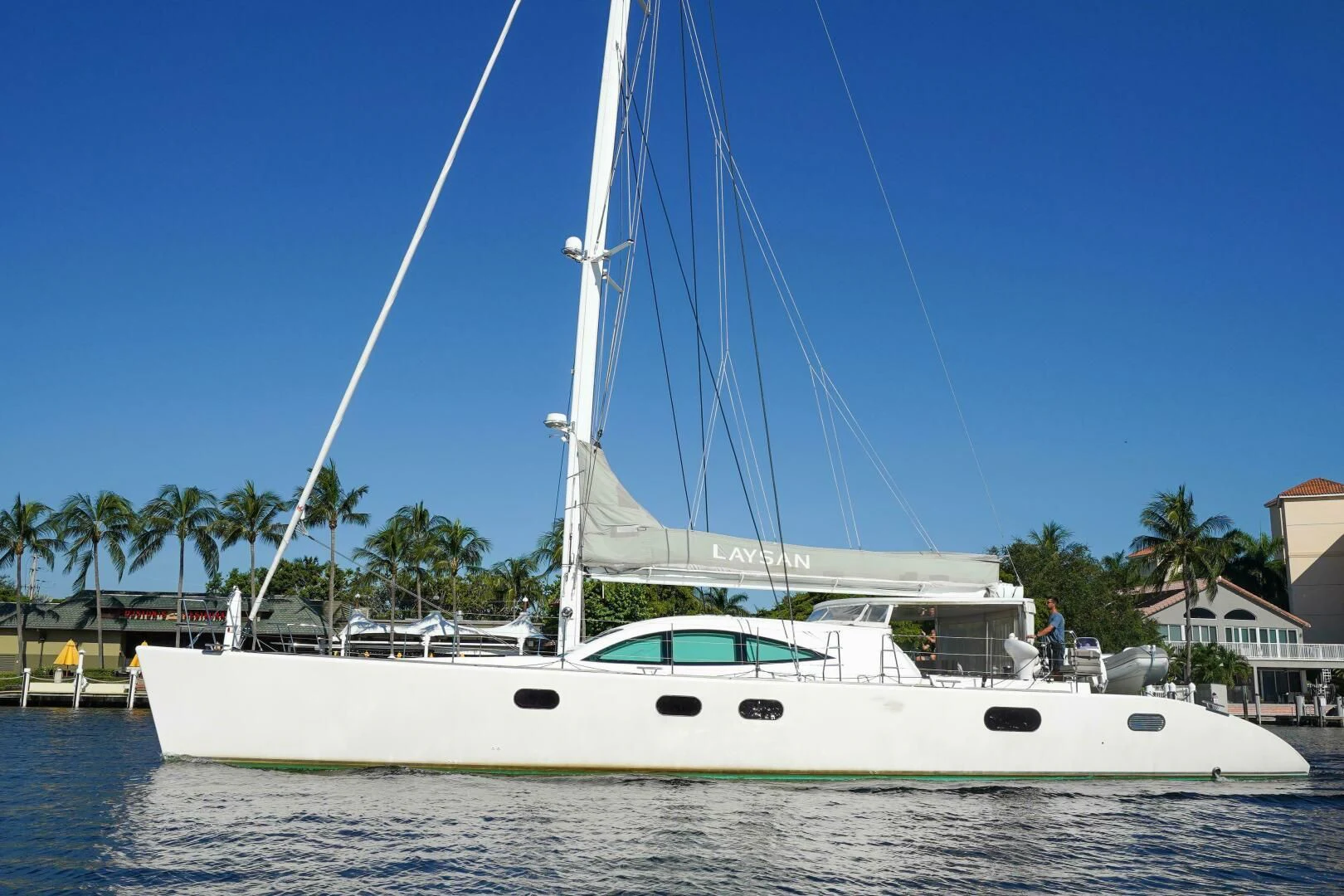 a white boat on the water aboard LAYSAN Yacht for Sale