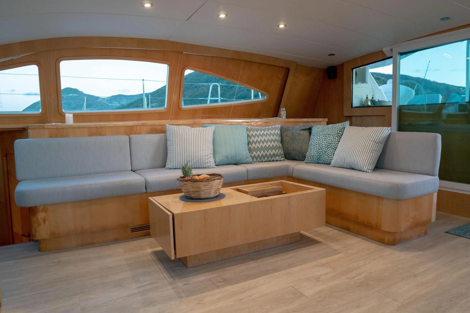 a couch in a room aboard LAYSAN Yacht for Sale