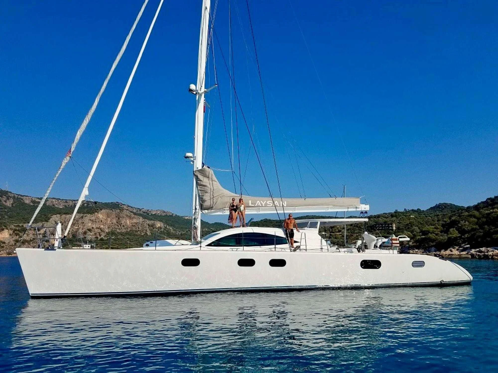 a sailboat on the water aboard LAYSAN Yacht for Sale