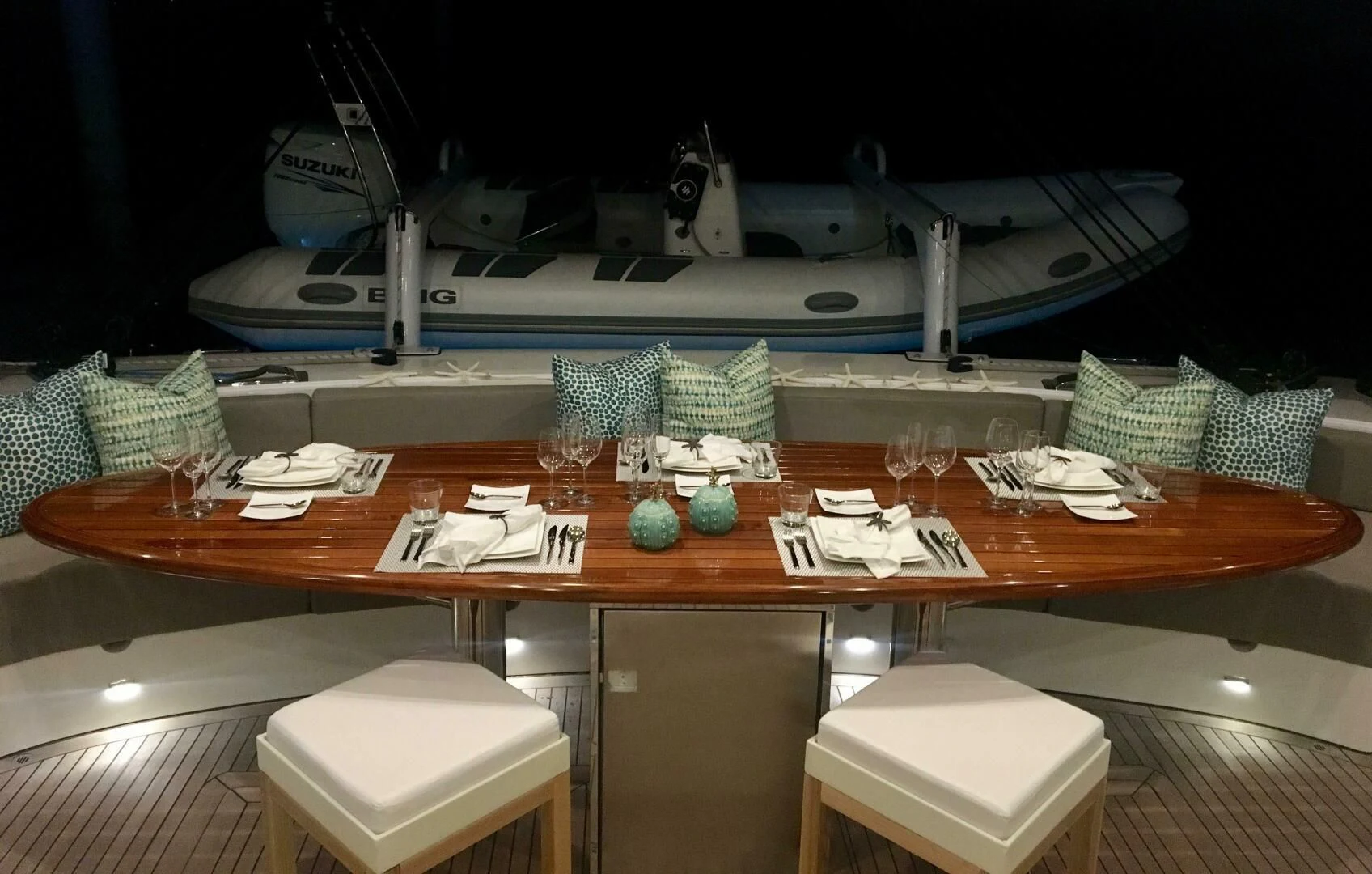 a table with a boat on it aboard LAYSAN Yacht for Sale