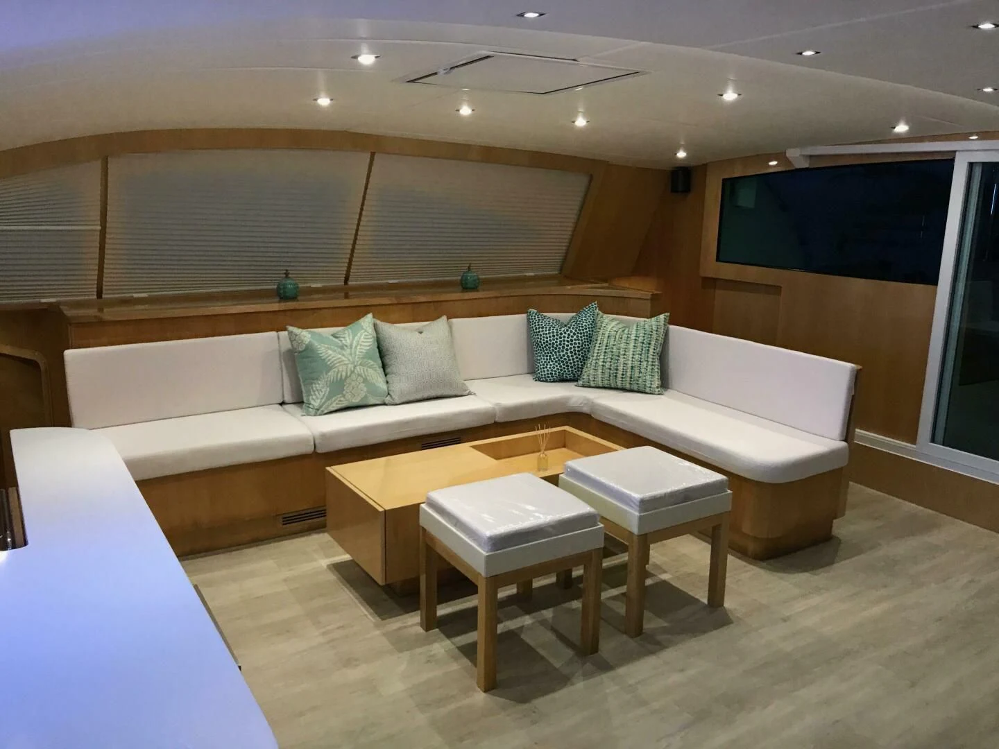 a living room with a couch and a table aboard LAYSAN Yacht for Sale