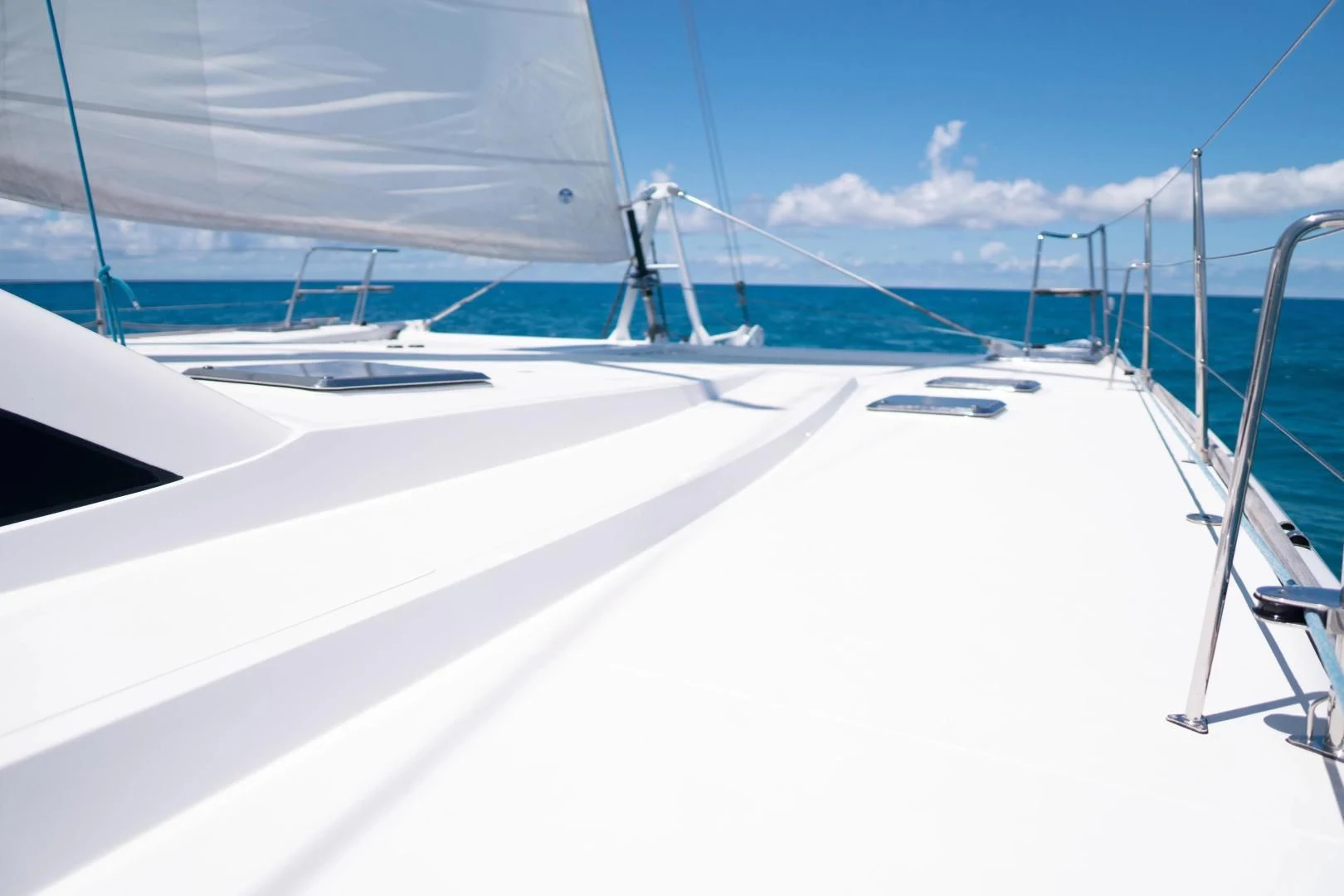 a white boat with ropes aboard LAYSAN Yacht for Sale