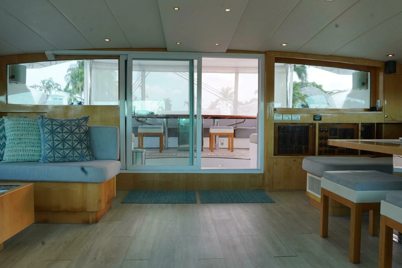 a room with a couch and a table aboard LAYSAN Yacht for Sale