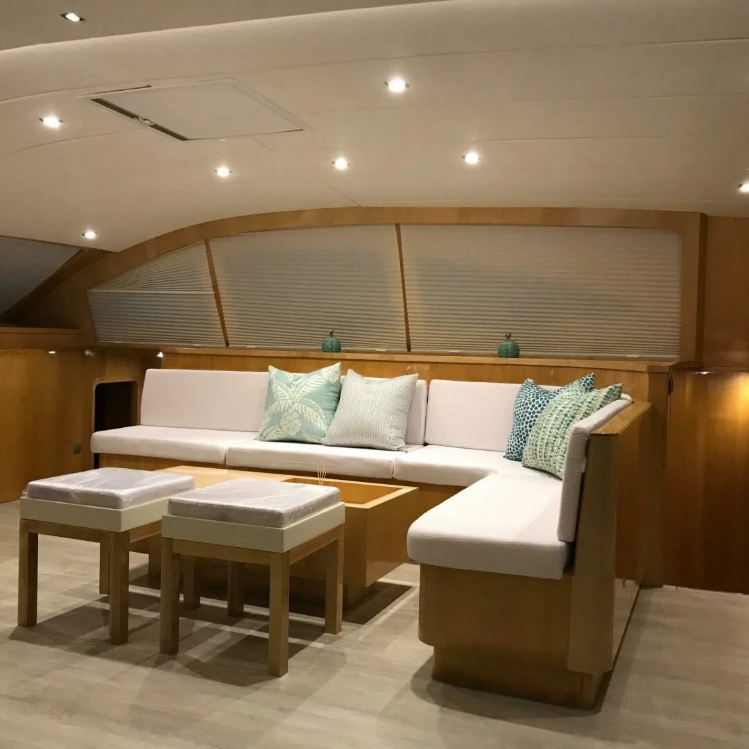 a room with a couch and a table aboard LAYSAN Yacht for Sale