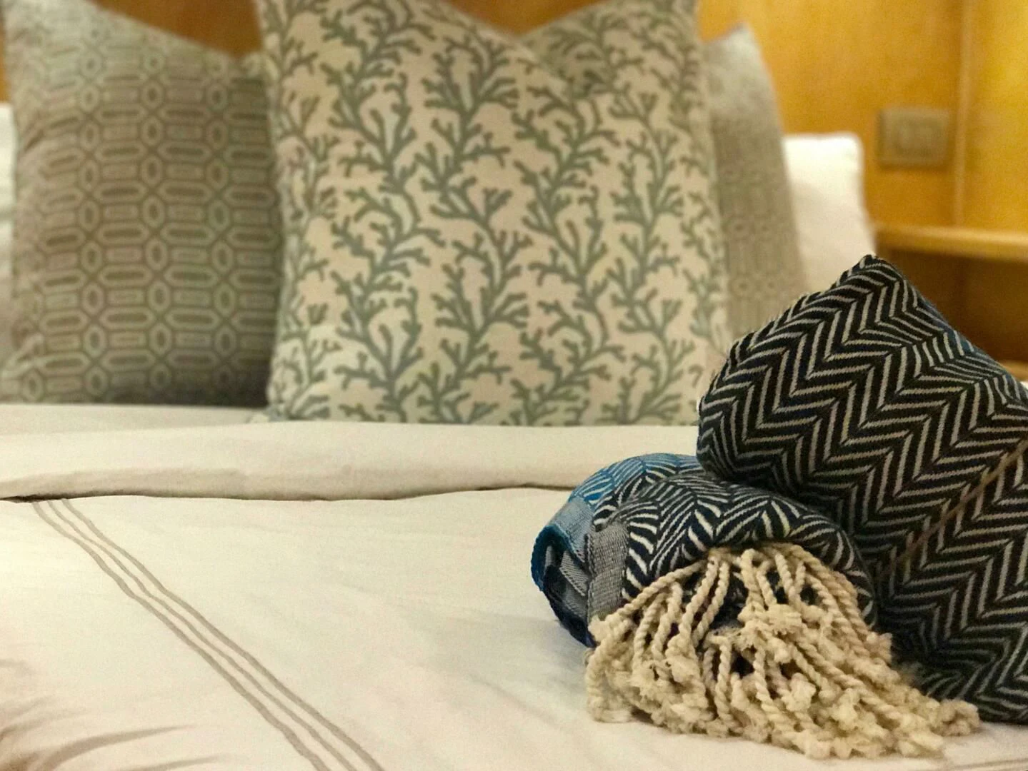 a pair of socks on a couch aboard LAYSAN Yacht for Sale