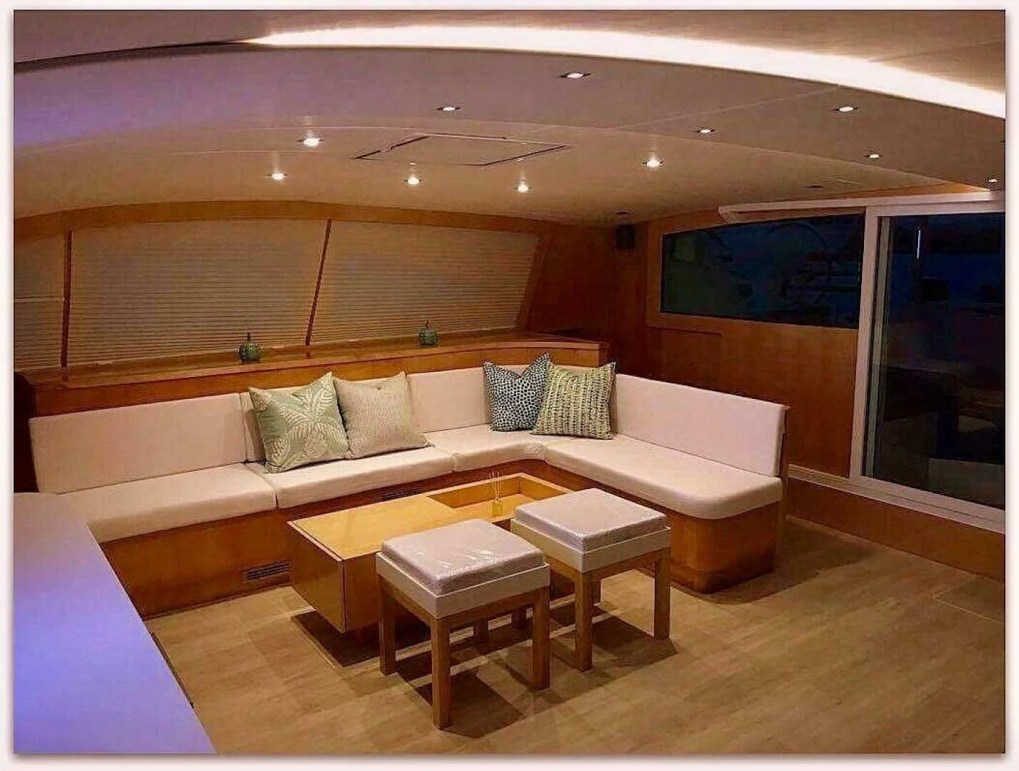 a room with a couch and a table aboard LAYSAN Yacht for Sale