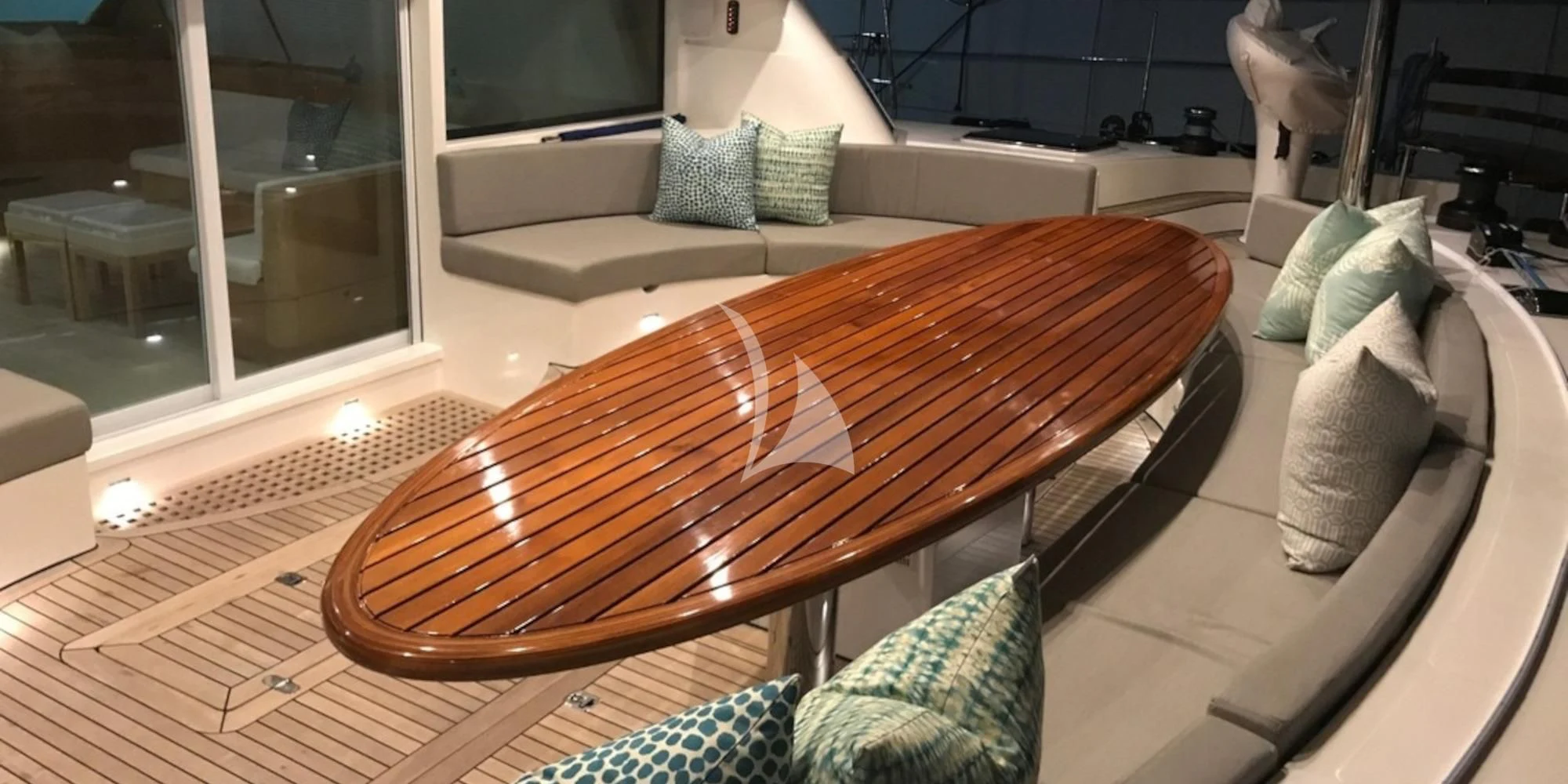 a bed with a wood frame aboard LAYSAN Yacht for Sale