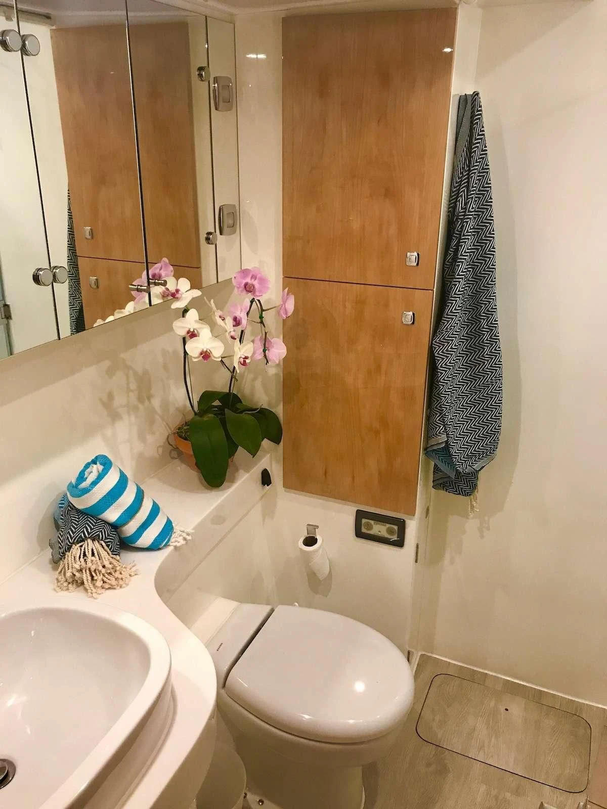 a bathroom with a toilet and sink aboard LAYSAN Yacht for Sale