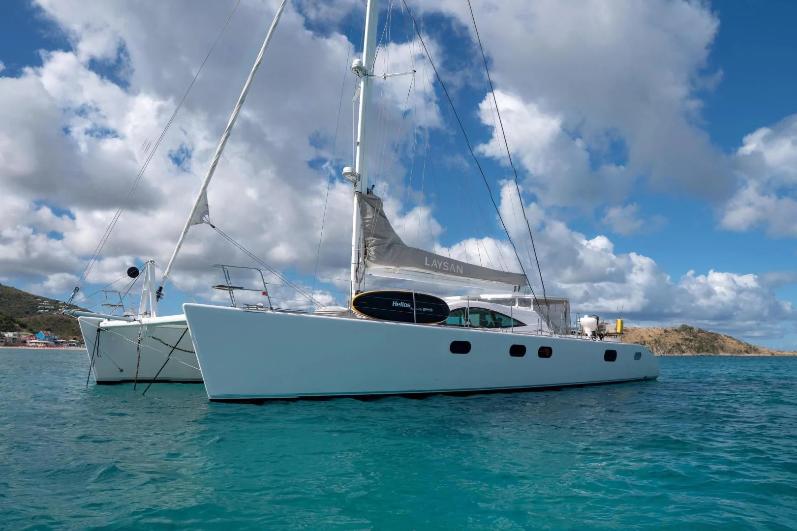 a white boat in the water aboard LAYSAN Yacht for Sale