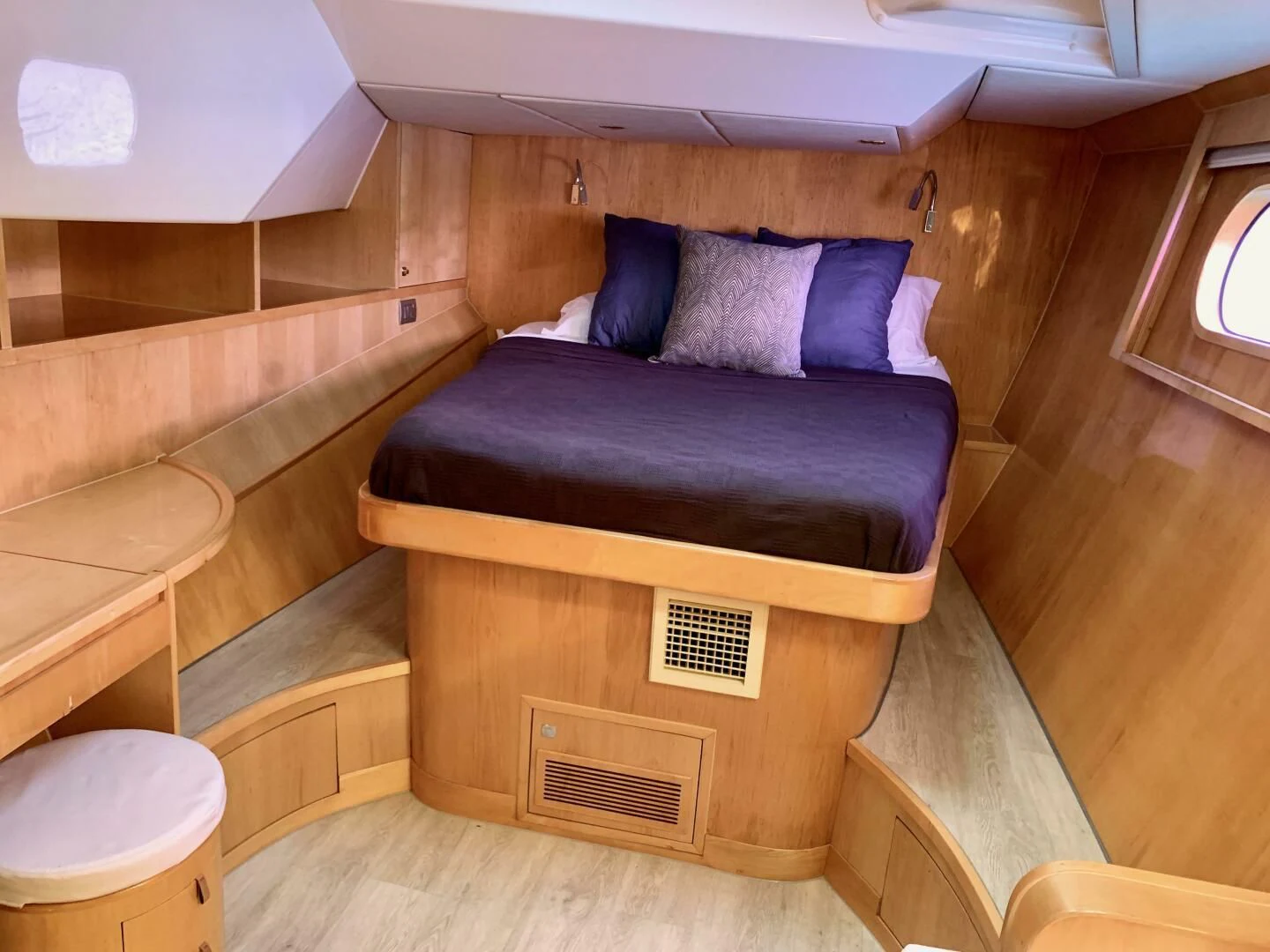 a bed in a room aboard LAYSAN Yacht for Sale