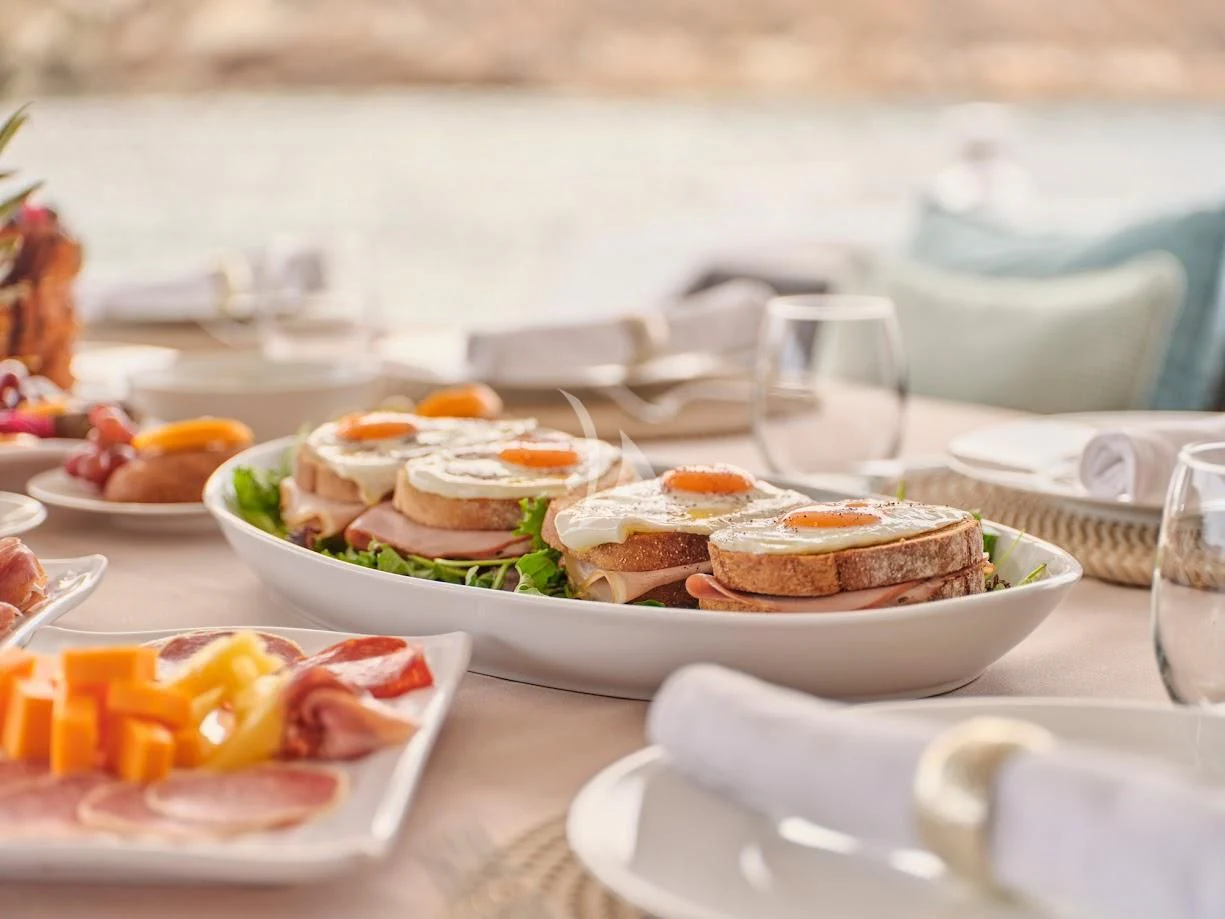 a table full of food aboard DOLLY Yacht for Charter