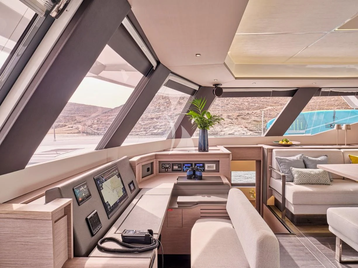 a room with a couch and a computer aboard DOLLY Yacht for Charter