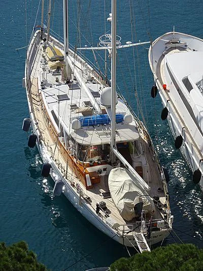 a large boat is parked on the water aboard FREEDOM Yacht for Sale