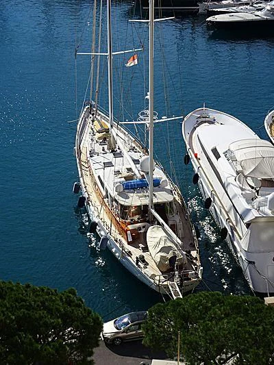 a boat docked at a pier aboard FREEDOM Yacht for Sale