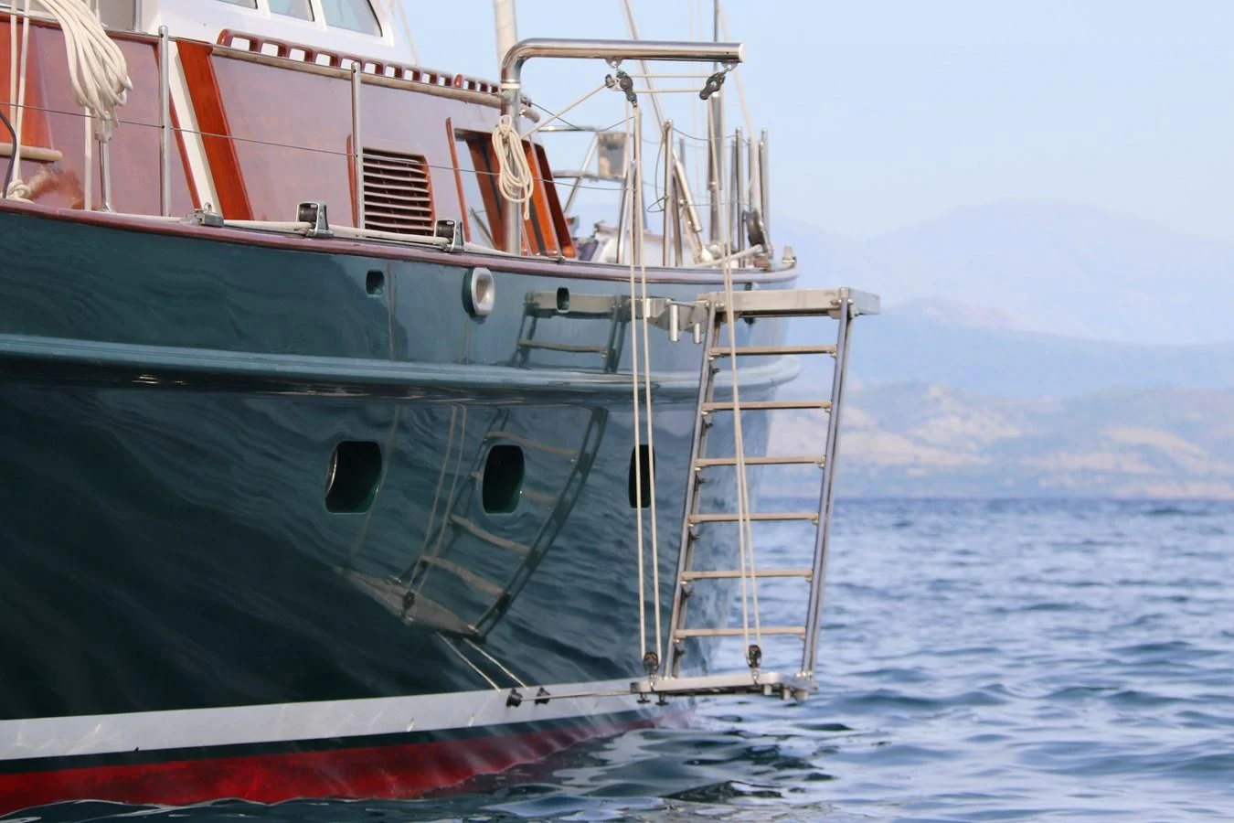 a large boat in the water aboard KEEWAYDIN Yacht for Sale